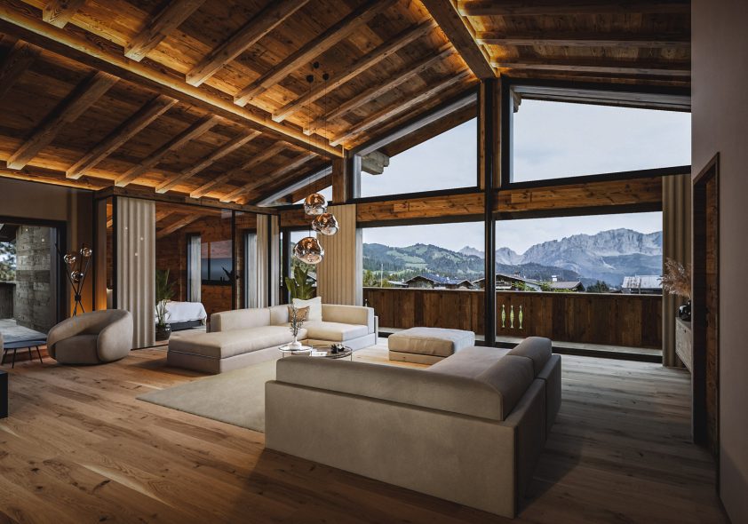 Luxuriöses Alpen-Wohnzimmer mit rustikaler Holzdecke, modernem Interieur und Bergpanorama.